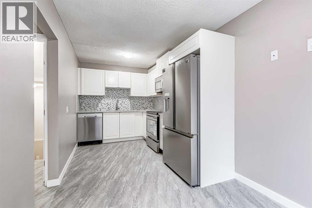 4316 4a Avenue, Calgary, Alberta  T2A 3B8 - Photo 3 - A2276349