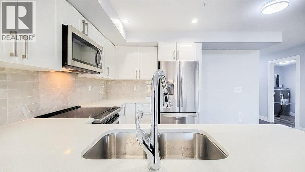 103 1990 Westminster Avenue, Coquitlam, British Columbia  V3B 1E8 - Photo 4 - R3078870