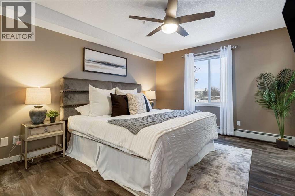 8128, 304 Mackenzie Way Sw, Airdrie, Alberta  T4B 3H8 - Photo 11 - A2274092