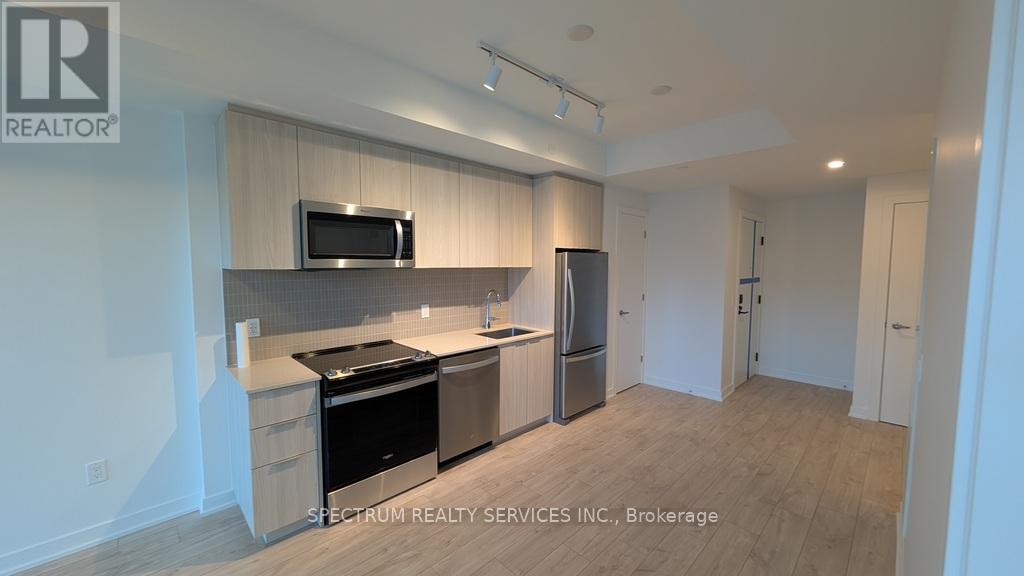 301 - 750 Whitlock Avenue, Milton, Ontario  L9E 2B4 - Photo 5 - W12682476