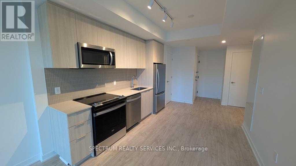 301 - 750 Whitlock Avenue, Milton, Ontario  L9E 2B4 - Photo 6 - W12682476