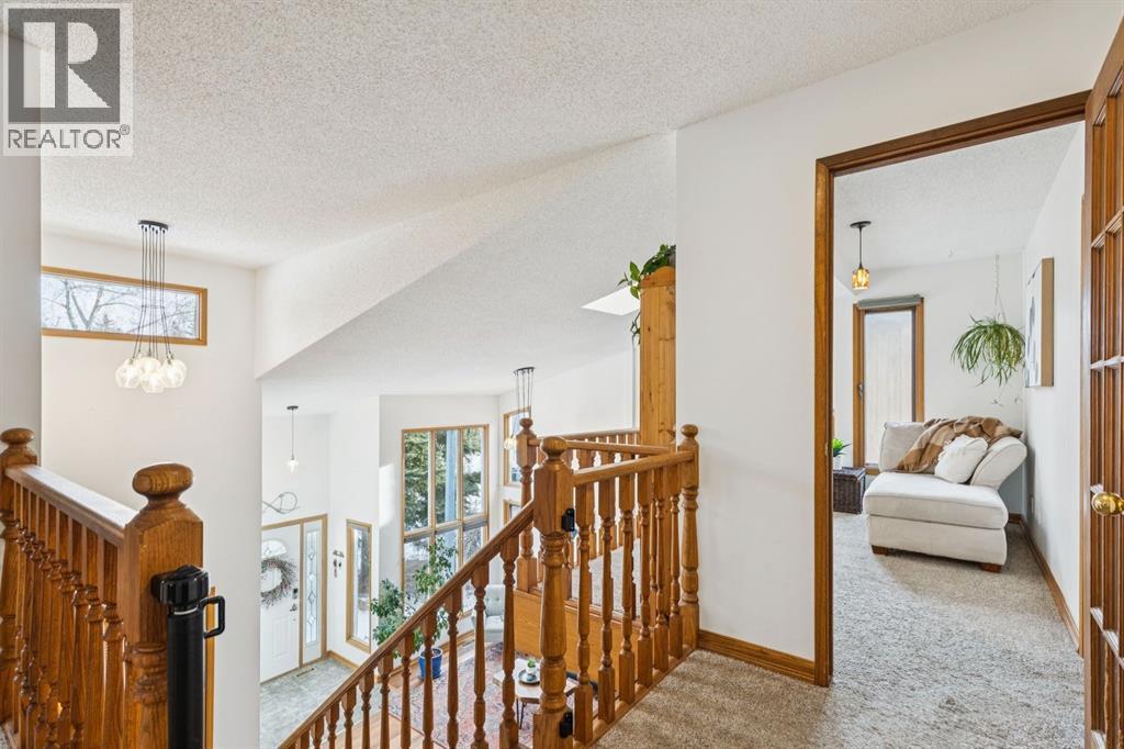 715 Coach Bluff Crescent Sw, Calgary, Alberta  T3H 1A9 - Photo 20 - A2277368