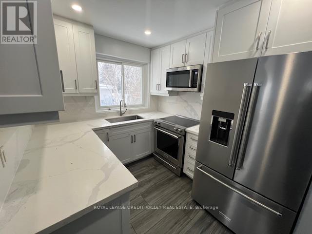 50 Epsom Downs Drive, Brampton, Ontario  L6T 1Y8 - Photo 15 - W12689262