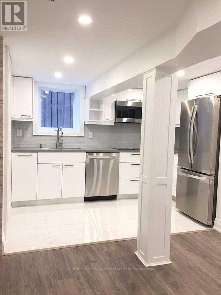 C - 340 Kenilworth Avenue, Toronto, Ontario  M4L 3S8 - Photo 1 - E12692400