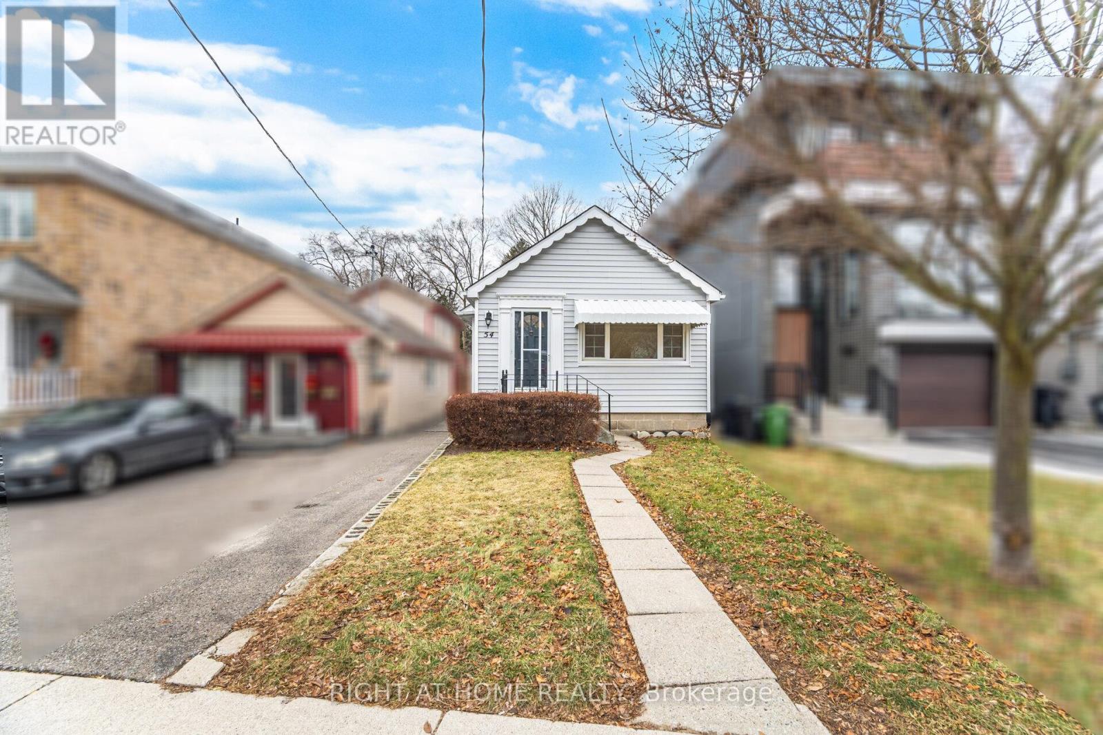 54 Thirty First Street, Toronto, Ontario  M8W 3E9 - Photo 3 - W12692786