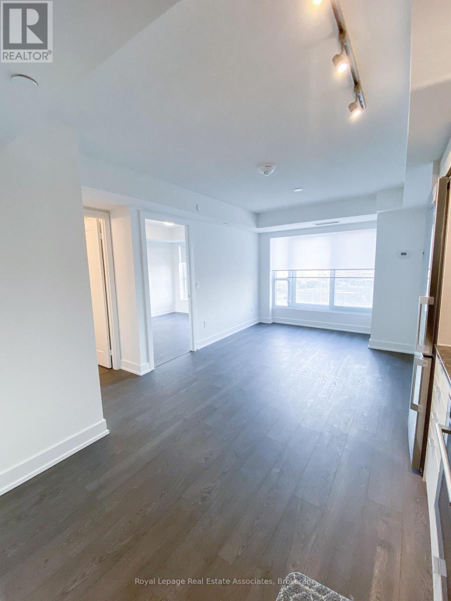 405 - 7 Mabelle Avenue, Toronto, Ontario  M5T 0C9 - Photo 4 - W12692850