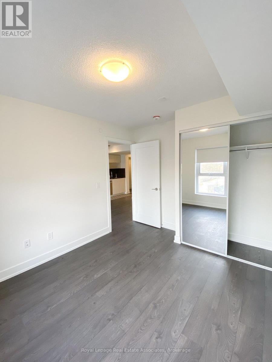 405 - 7 Mabelle Avenue, Toronto, Ontario  M5T 0C9 - Photo 6 - W12692850