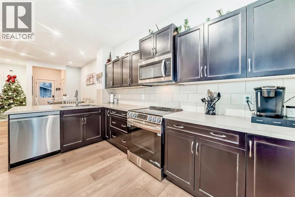 58 Reunion Grove Nw, Airdrie, Alberta  T4B 0Z2 - Photo 5 - A2277875