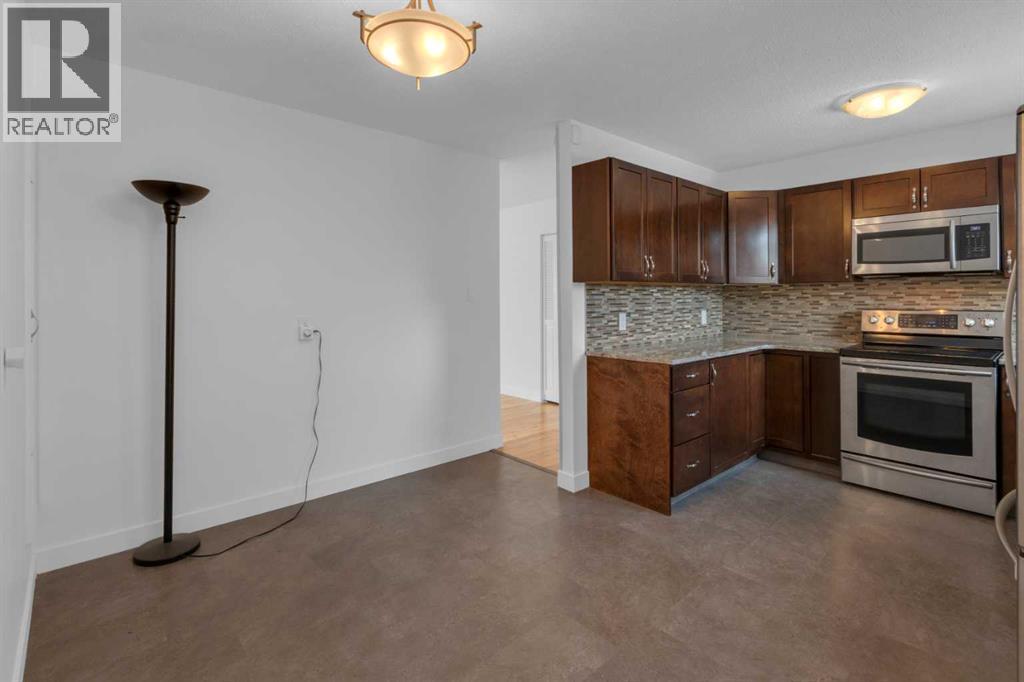 6312 Thorncliffe Drive Nw, Calgary, Alberta  T2K 3A7 - Photo 9 - A2278293