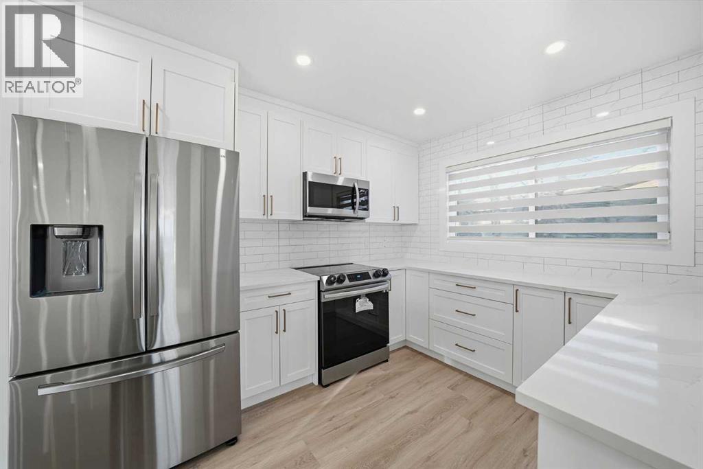 304 Huntbourne Hill Ne, Calgary, Alberta  T2K 3Y4 - Photo 7 - A2278014