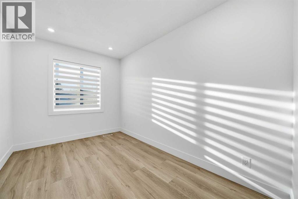 304 Huntbourne Hill Ne, Calgary, Alberta  T2K 3Y4 - Photo 12 - A2278014