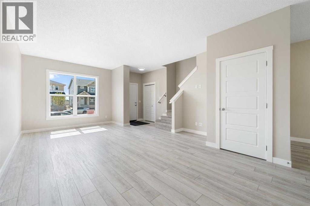 340 Cobblestone Gate Sw, Airdrie, Alberta  T4B 5J9 - Photo 5 - A2278363