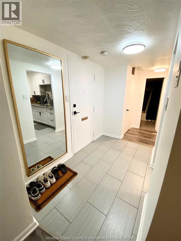 111 Riverside Drive East Unit# 107, Windsor, Ontario  N9A 2S6 - Photo 5 - 26001022