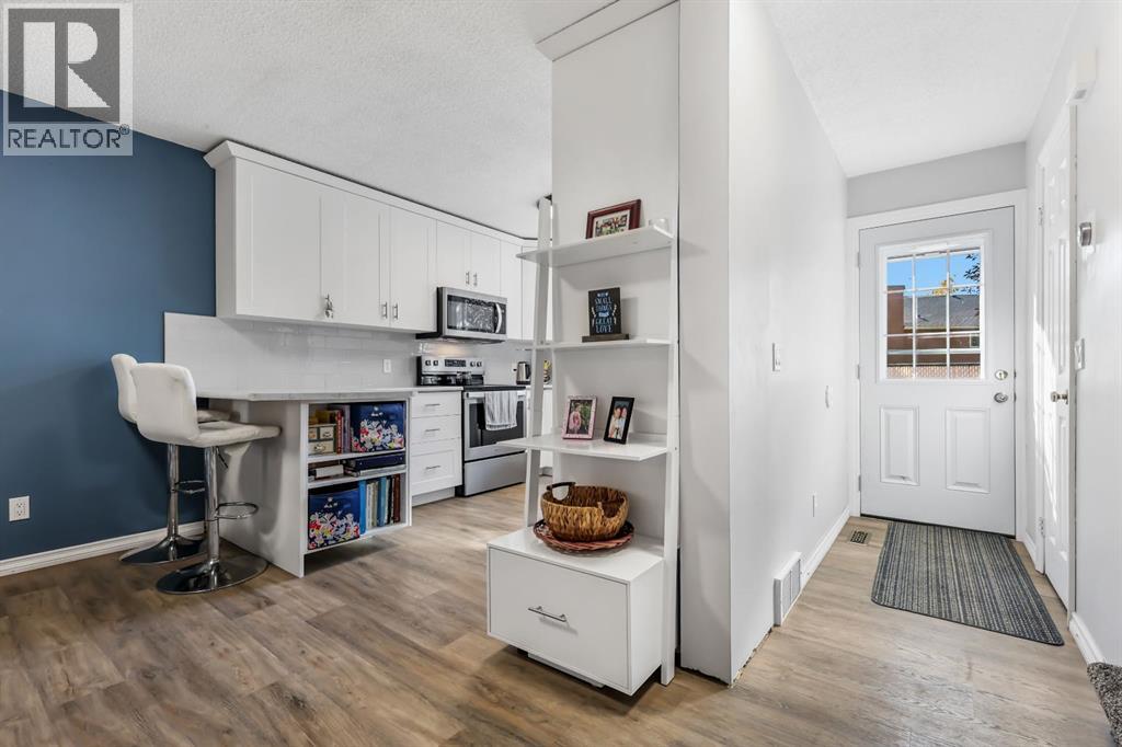 8, 7 Westland Road, Okotoks, Alberta  T1S 1Z1 - Photo 7 - A2278487