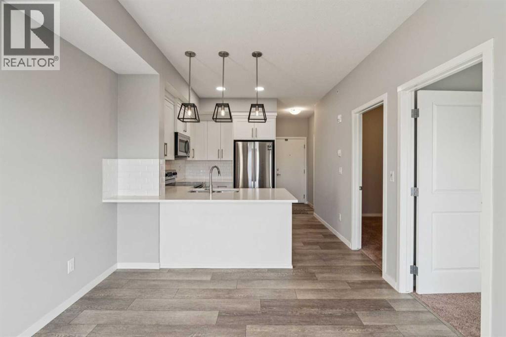 407, 370 Harvest Hills Common Ne, Calgary, Alberta  T3K 2M8 - Photo 15 - A2278506