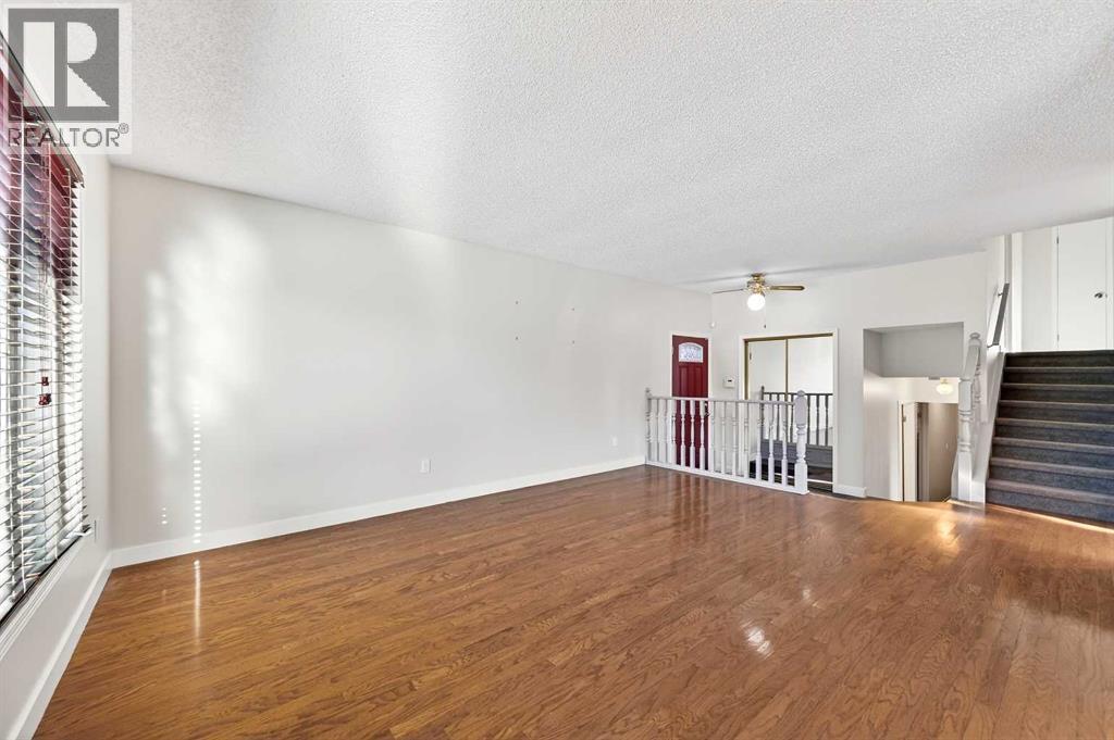 103 Sandarac Place Nw, Calgary, Alberta  T3K 2Y5 - Photo 11 - A2277271