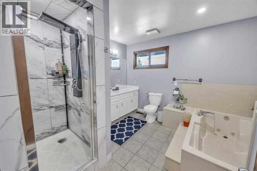 303 Ranchridge Bay Nw, Calgary, Alberta  T3G 1V5 - Photo 29 - A2278074