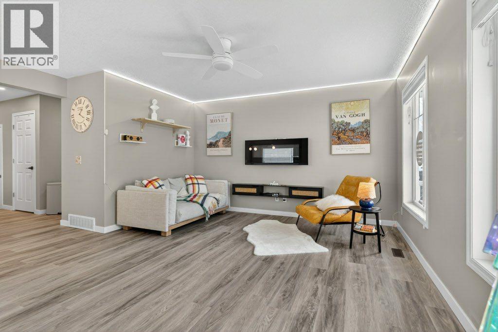 1012 Windsong Drive Sw, Airdrie, Alberta  T4B 0P2 - Photo 7 - A2277461