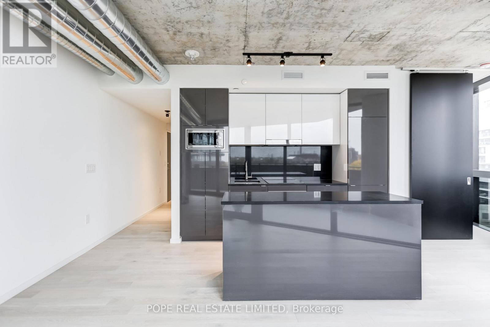 811 - 21 Lawren Harris Square, Toronto, Ontario  M5A 1H7 - Photo 6 - C12693944