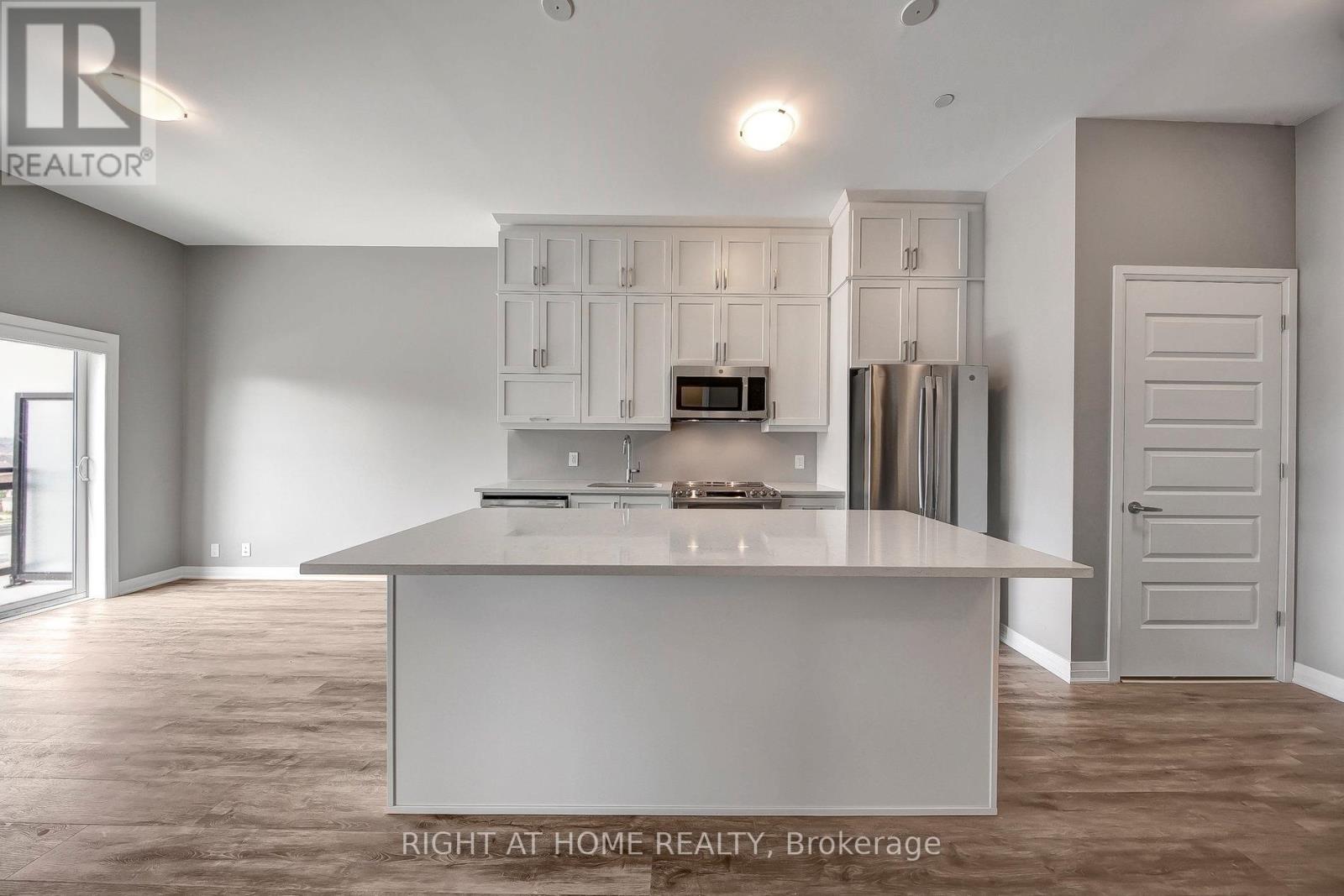 603 - 102 Grovewood Common, Oakville, Ontario  L6H 0X2 - Photo 16 - W12694106