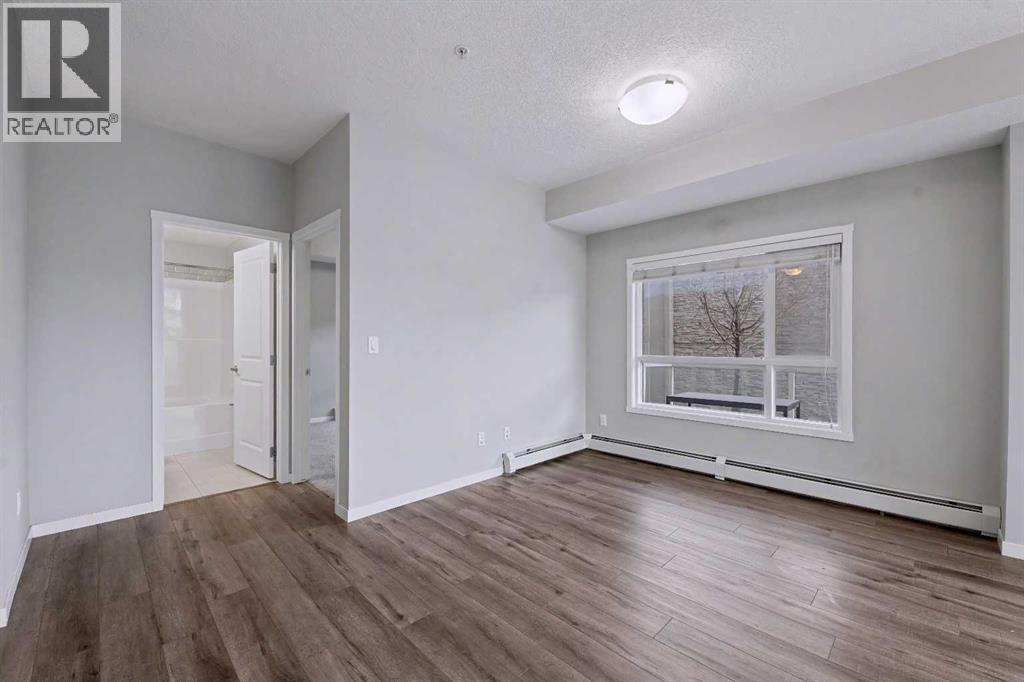 107, 360 Harvest Hills Common Ne, Calgary, Alberta  T3K 2N1 - Photo 19 - A2278636