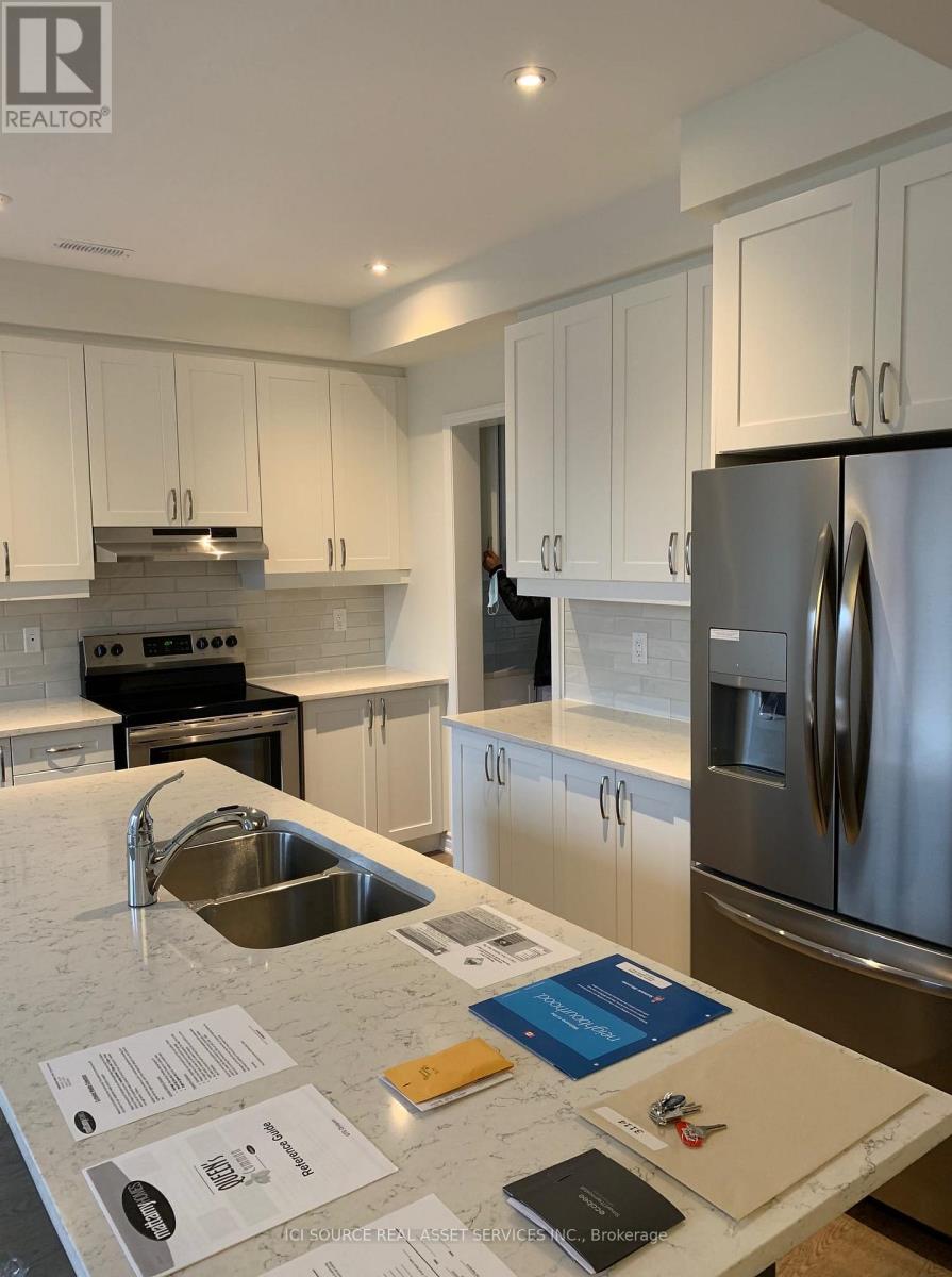 1 - 67 Fiesta Way, Whitby, Ontario  L1P 1Y5 - Photo 2 - E12665062