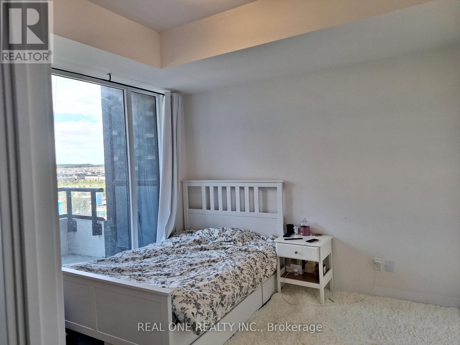 706 - 297 Oak Walk Drive, Oakville, Ontario  L6H 3R6 - Photo 2 - W12695032