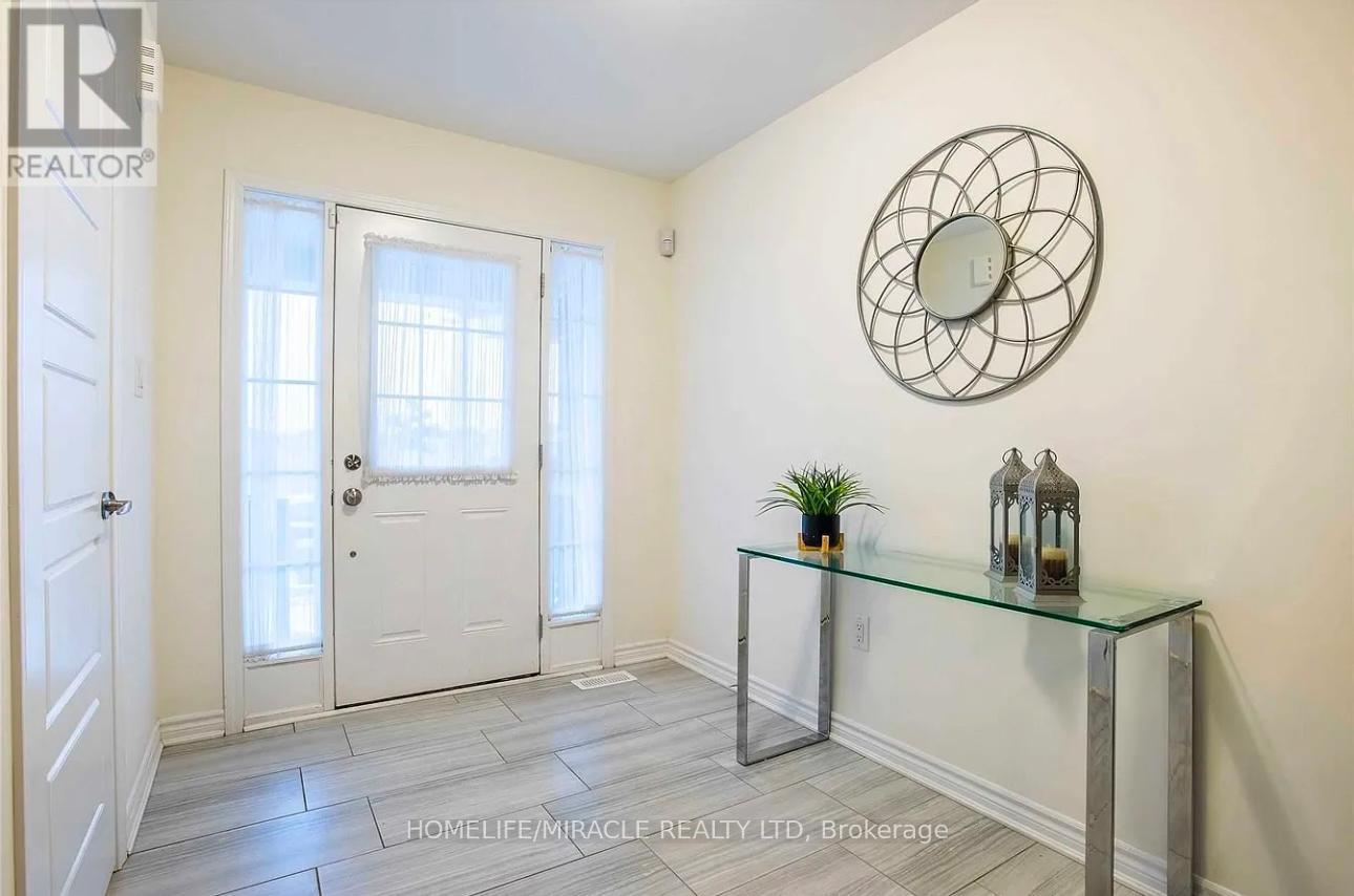 Main Floor - 122 Thornbush Boulevard, Brampton, Ontario  L7A 0A8 - Photo 1 - W12695146