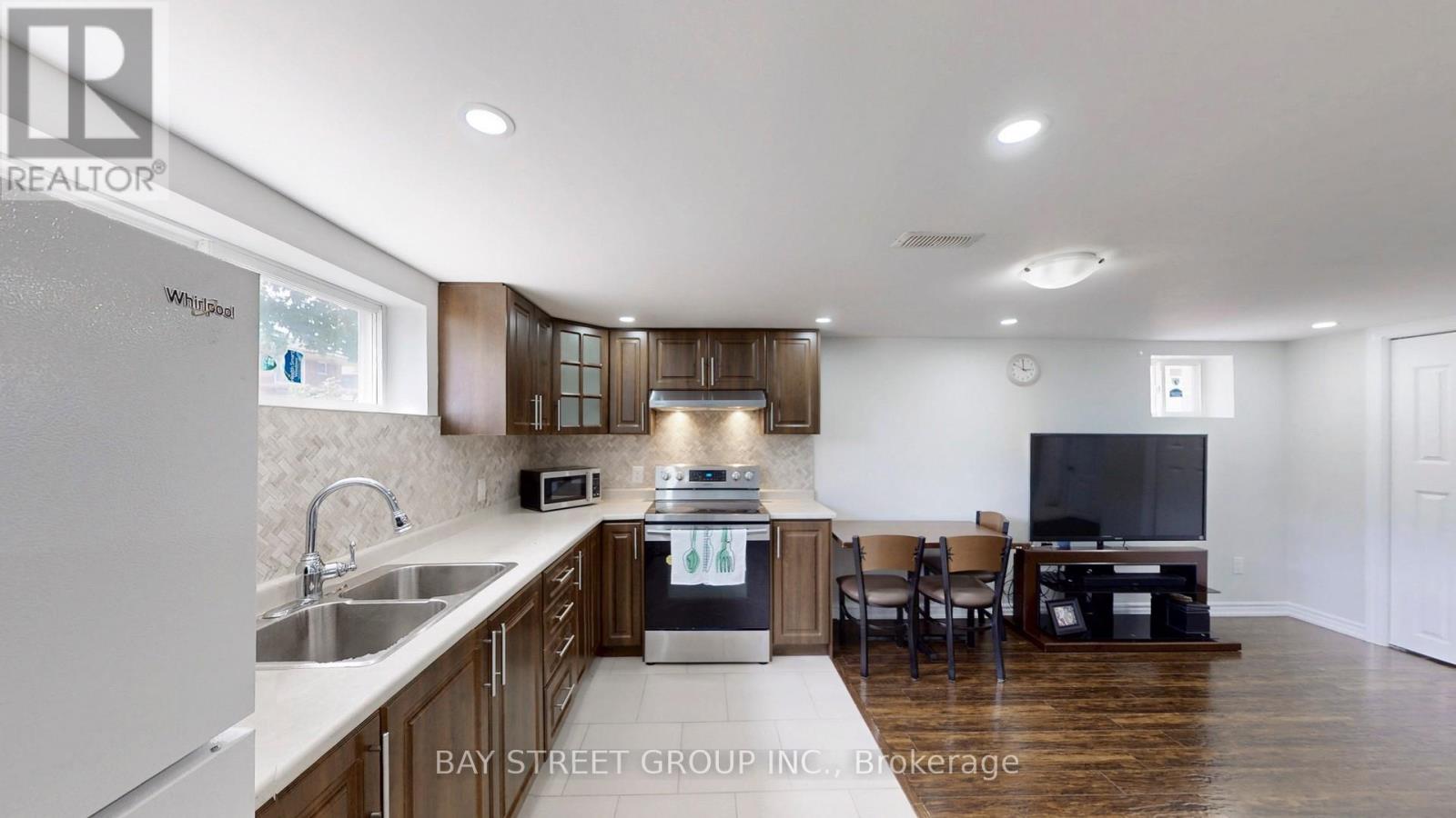 15 Macleod Street, Toronto, Ontario  M6L 2M7 - Photo 18 - W12695250