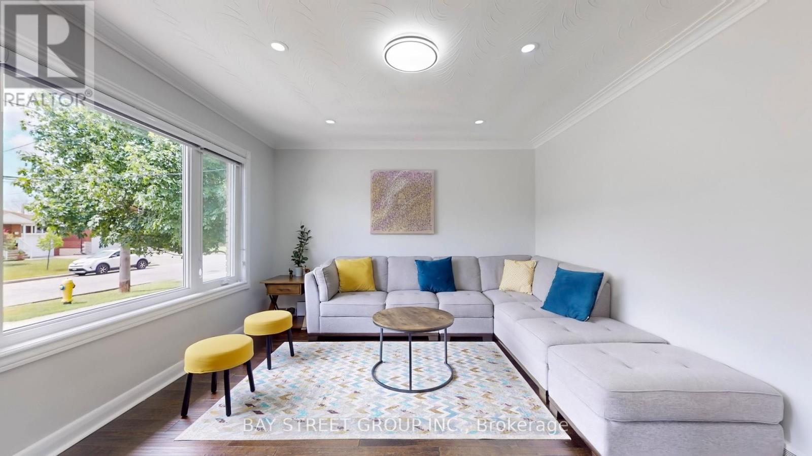 15 Macleod Street, Toronto, Ontario  M6L 2M7 - Photo 2 - W12695250