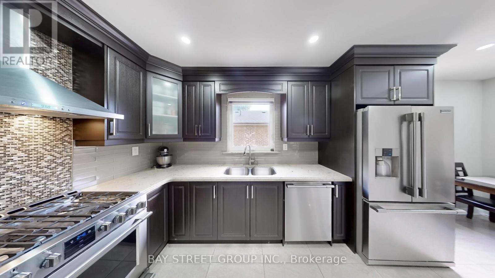 15 Macleod Street, Toronto, Ontario  M6L 2M7 - Photo 7 - W12695250