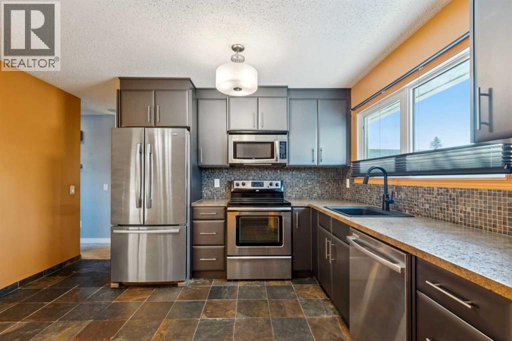 5423 Madigan Drive Ne, Calgary, Alberta  T2A 5T5 - Photo 8 - A2278593