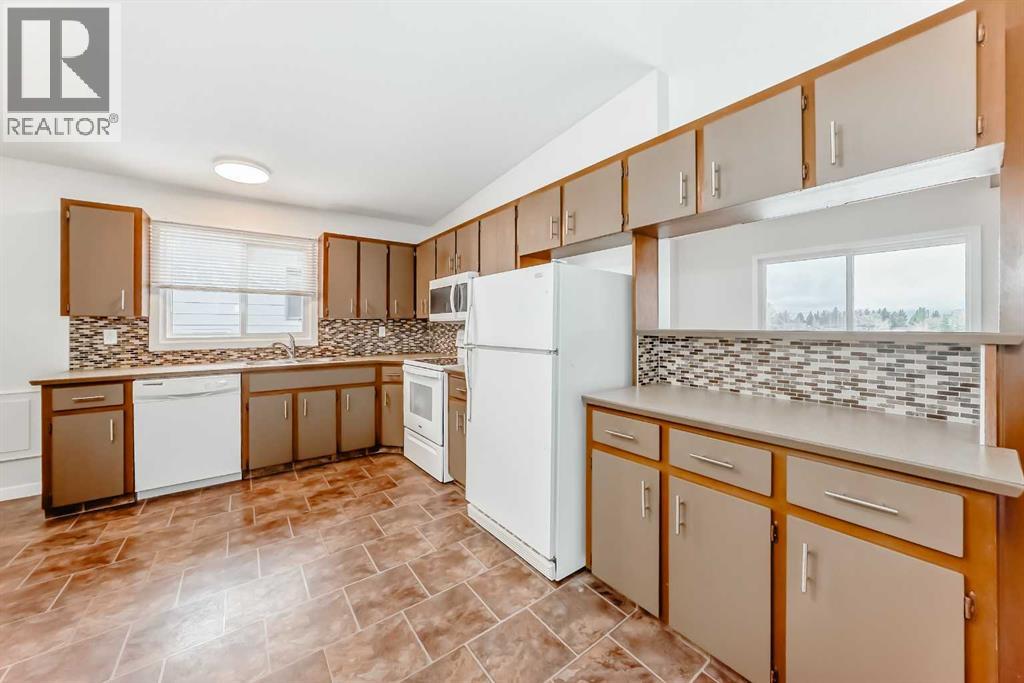 6527 58 Street Nw, Calgary, Alberta  T3A 2A4 - Photo 10 - A2278799