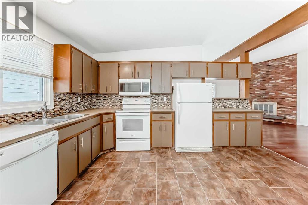 6527 58 Street Nw, Calgary, Alberta  T3A 2A4 - Photo 7 - A2278799