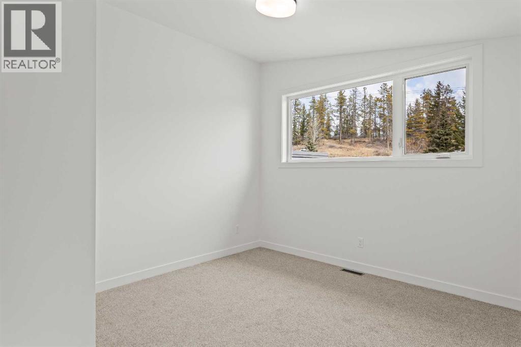249a Three Sisters Drive, Canmore, Alberta  T1W 2M4 - Photo 41 - A2268386