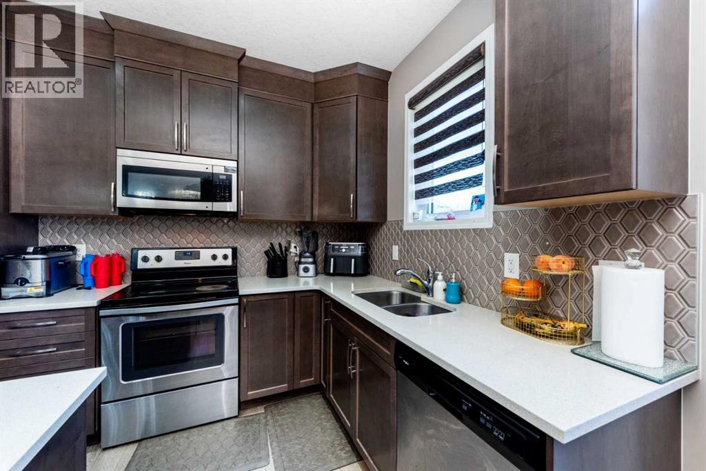 167 Windford Street Sw, Airdrie, Alberta  T4B 4G3 - Photo 3 - A2276892