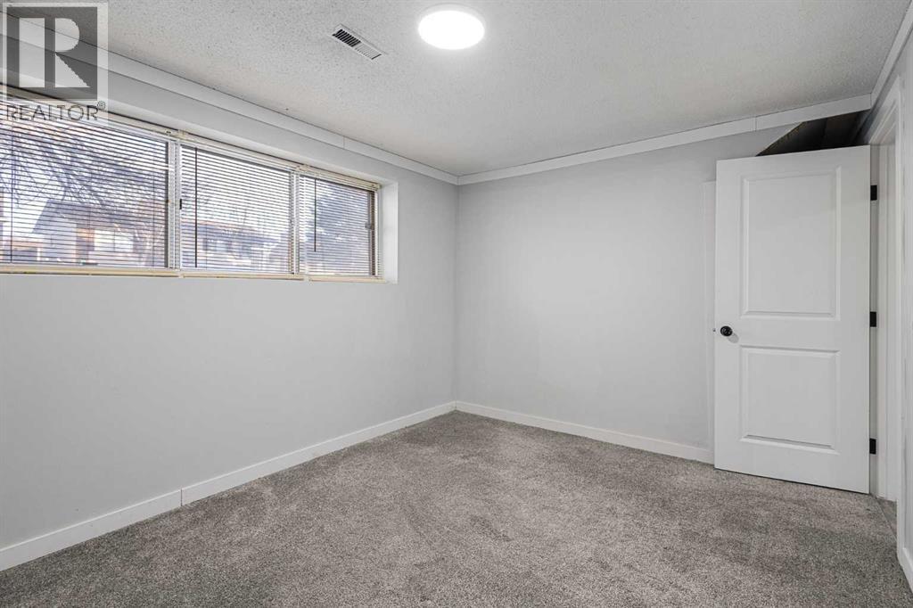 255 Rundleridge Drive Ne, Calgary, Alberta  T1Y 2K5 - Photo 29 - A2276432