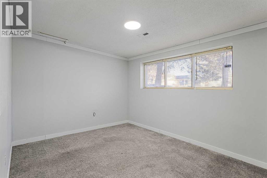255 Rundleridge Drive Ne, Calgary, Alberta  T1Y 2K5 - Photo 28 - A2276432