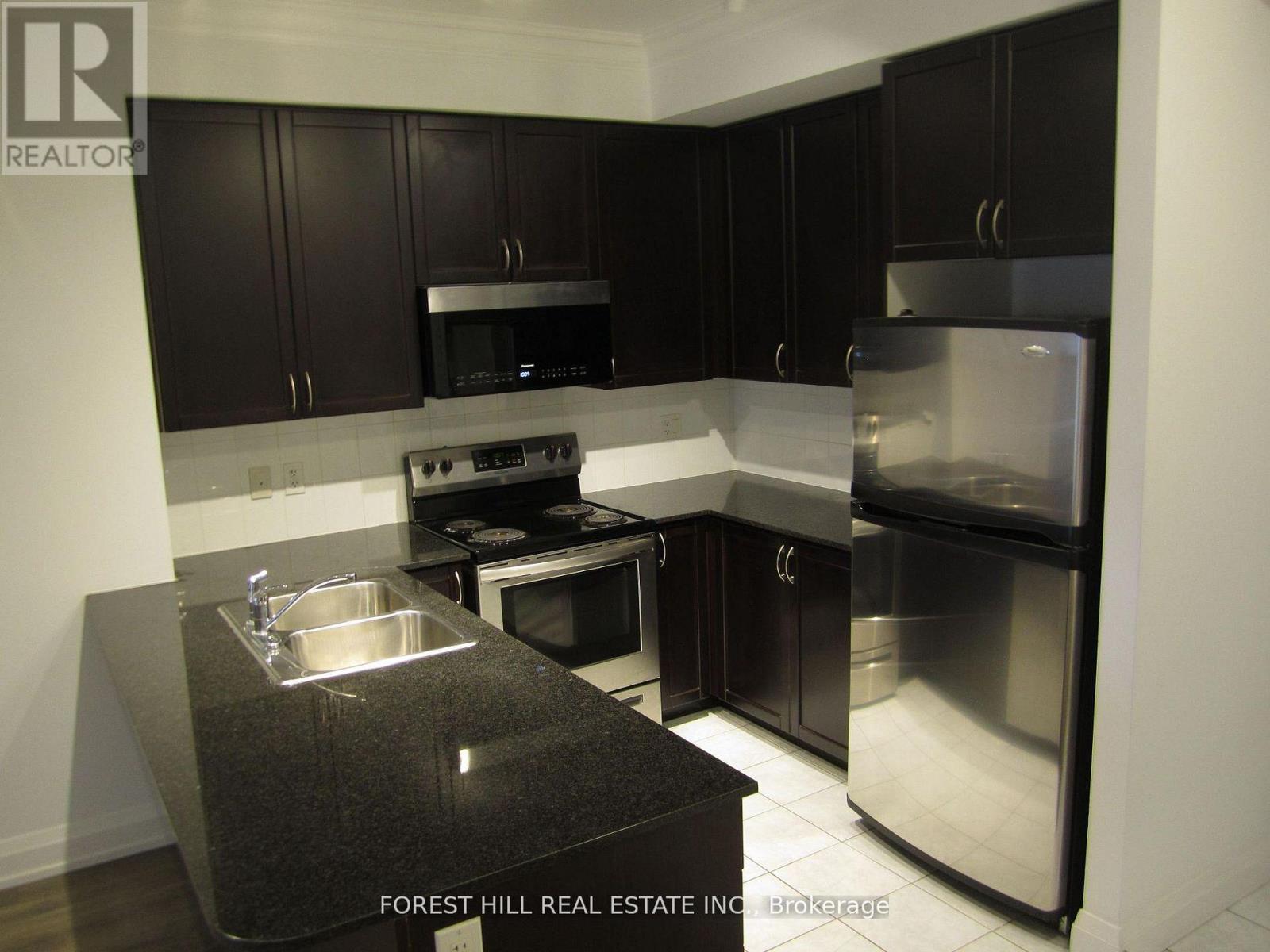 402 - 83 Woodbridge Avenue, Vaughan, Ontario  L4L 2S6 - Photo 1 - N12696358