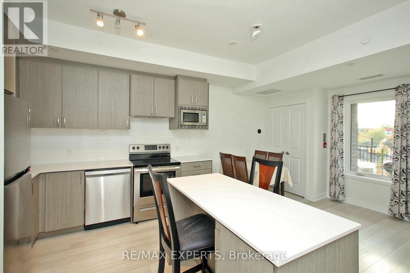 115 - 155 Downsview Park Boulevard, Toronto, Ontario  M3K 0E3 - Photo 11 - W12696666