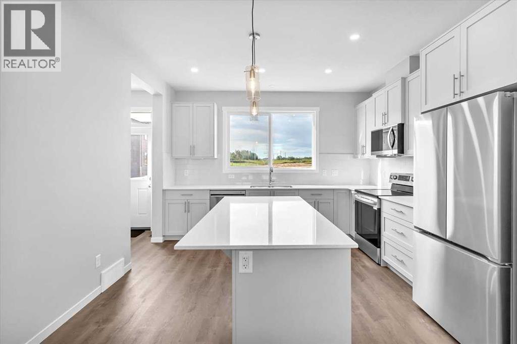 74 Wedderburn Drive, Okotoks, Alberta  T1S 5X2 - Photo 12 - A2277430