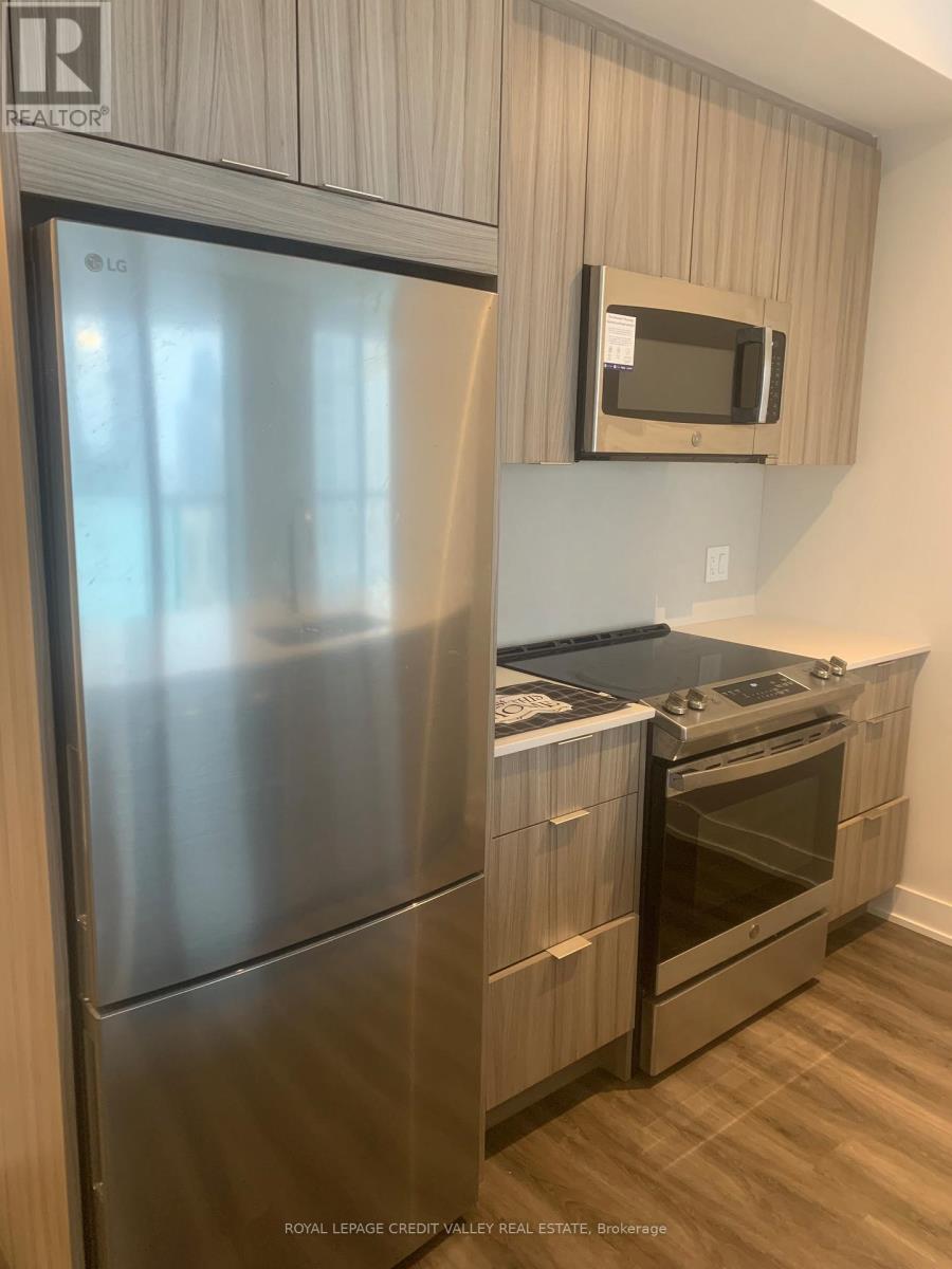 1203 - 430 Square One Drive, Mississauga, Ontario  L5B 0R7 - Photo 6 - W12696908