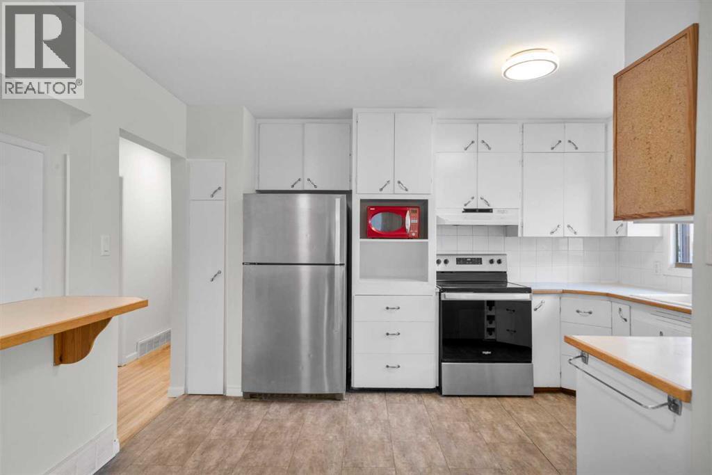 10631 Elbow Drive Sw, Calgary, Alberta  T2W 1G3 - Photo 7 - A2270130