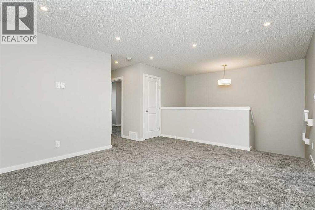 21 Heartwood Lane Se, Calgary, Alberta  T3M 2K1 - Photo 9 - A2271676