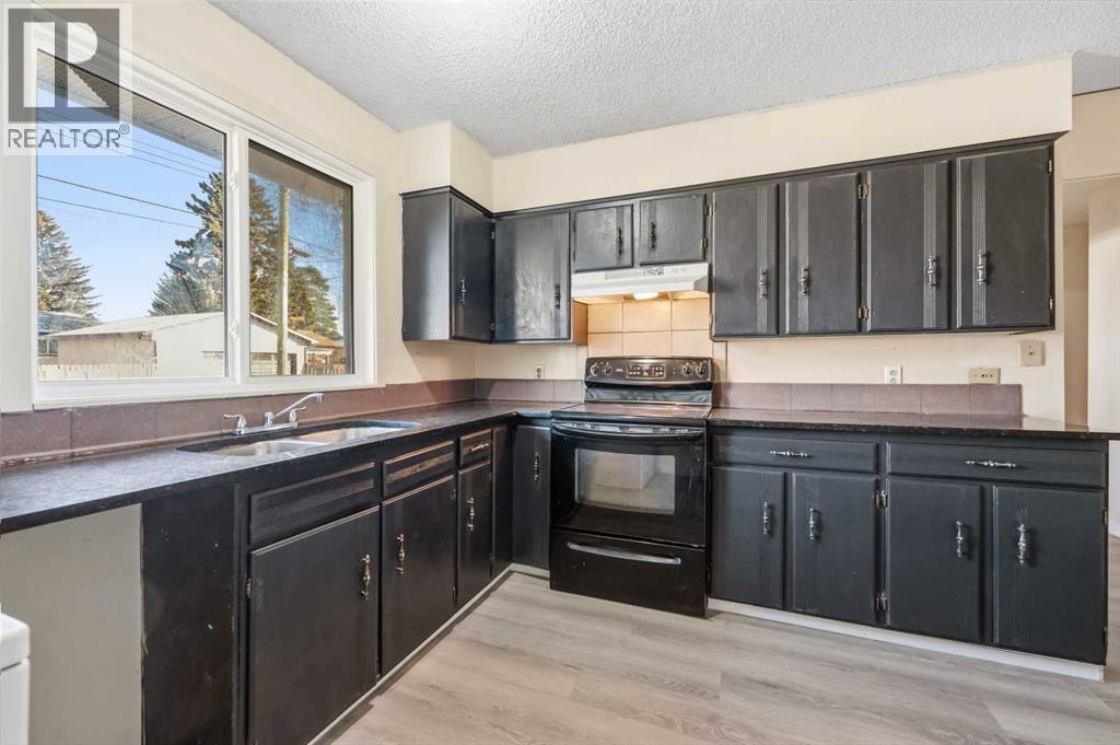 1643 Marlyn Way Ne, Calgary, Alberta  t2a 3k8 - Photo 11 - A2272011