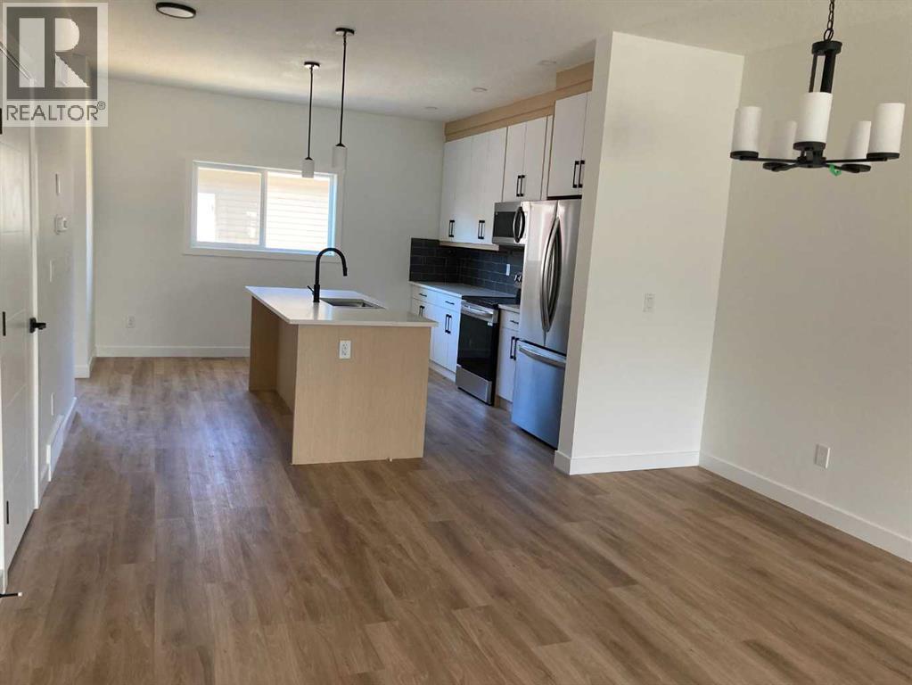 31 Baysprings Terrace Sw, Airdrie, Alberta  T4B 4A8 - Photo 3 - A2258932