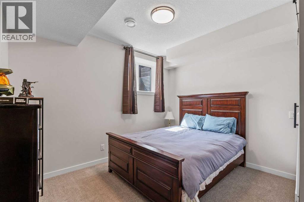 204, 201 Cooperswood Green Sw, Airdrie, Alberta  T3B 3Y6 - Photo 36 - A2277623