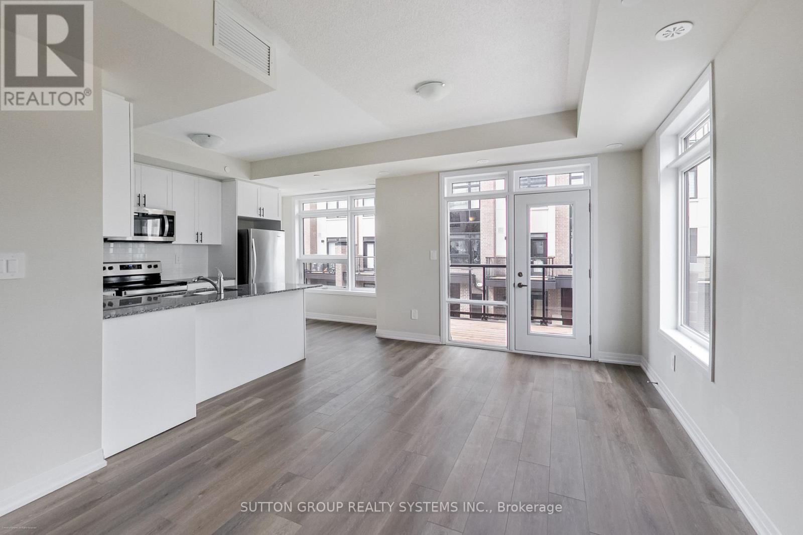 102 - 1593 Rose Way, Milton, Ontario  L9E 0J2 - Photo 4 - W12697614