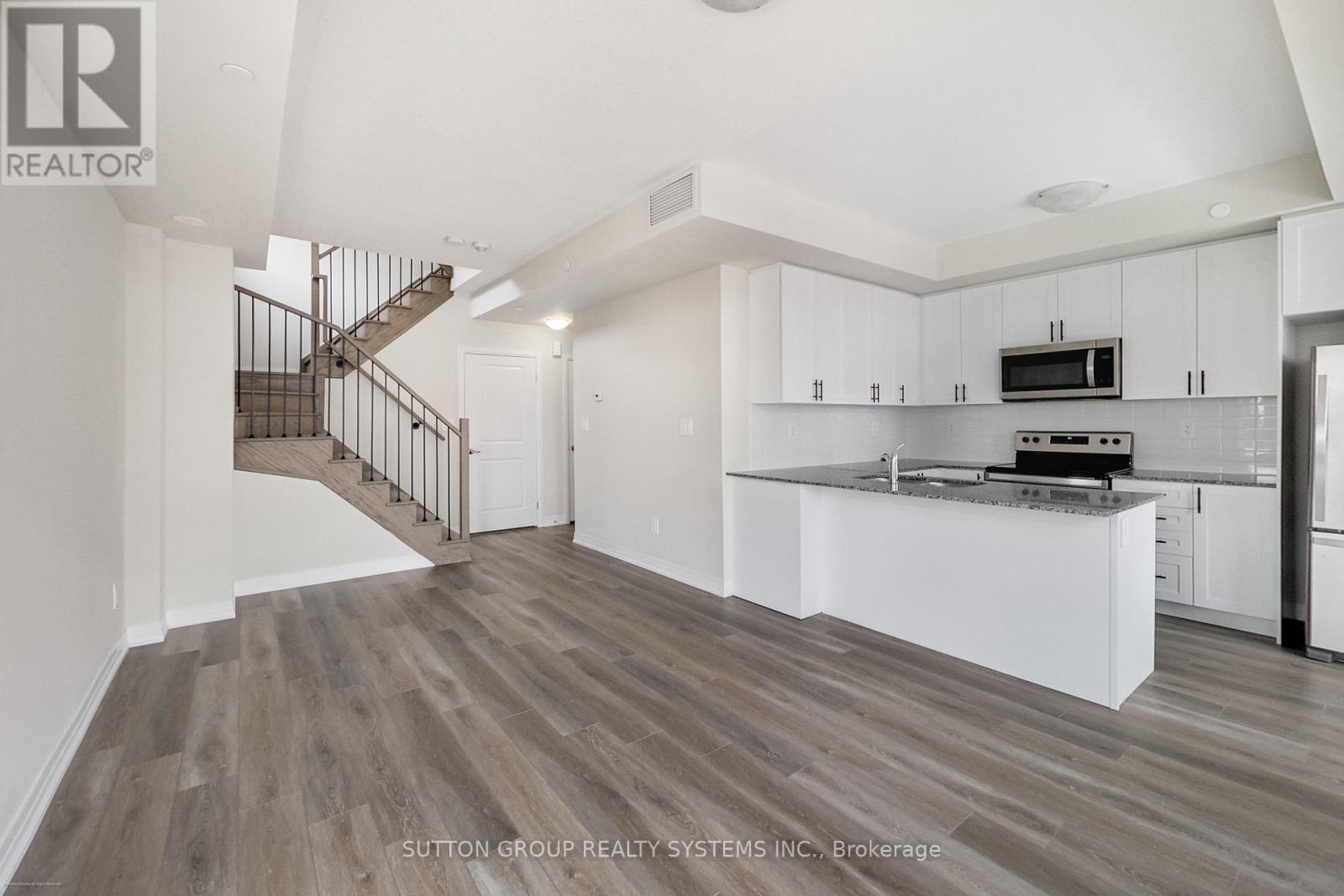 102 - 1593 Rose Way, Milton, Ontario  L9E 0J2 - Photo 5 - W12697614