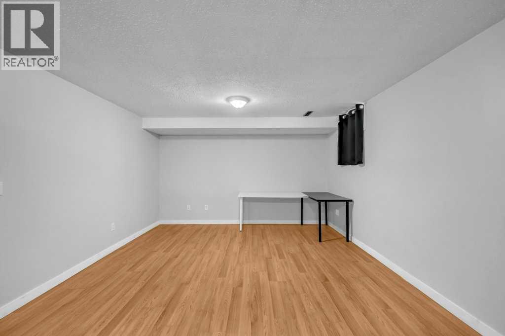 1140 Abbeydale Drive Ne, Calgary, Alberta  T2A 6L1 - Photo 23 - A2274421